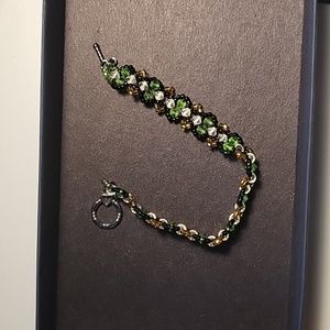 Green clear and black bracelet.